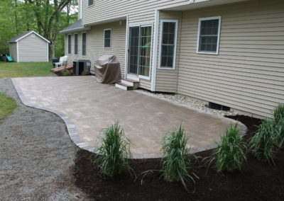 concrete-paver-patios-unilock-brussels-sandstone-paver-limestone-border